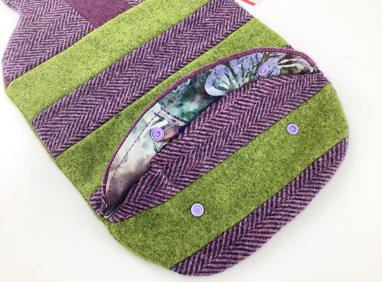 Abraham Moon Tweed Wool Patchwork Hot Water Bottle Cover. Bottle Shaped Wheat Bag Heat Pack. Batik Fabric Lining. Purple and Green